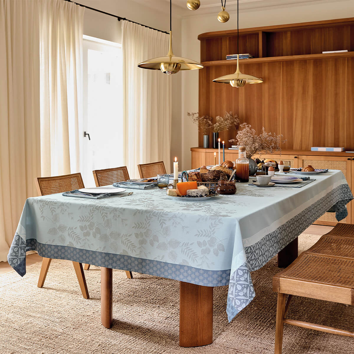 Le Jacquard Français Manor Lane tablecloth in Blue styled on dining table with autumn harvest setting.
