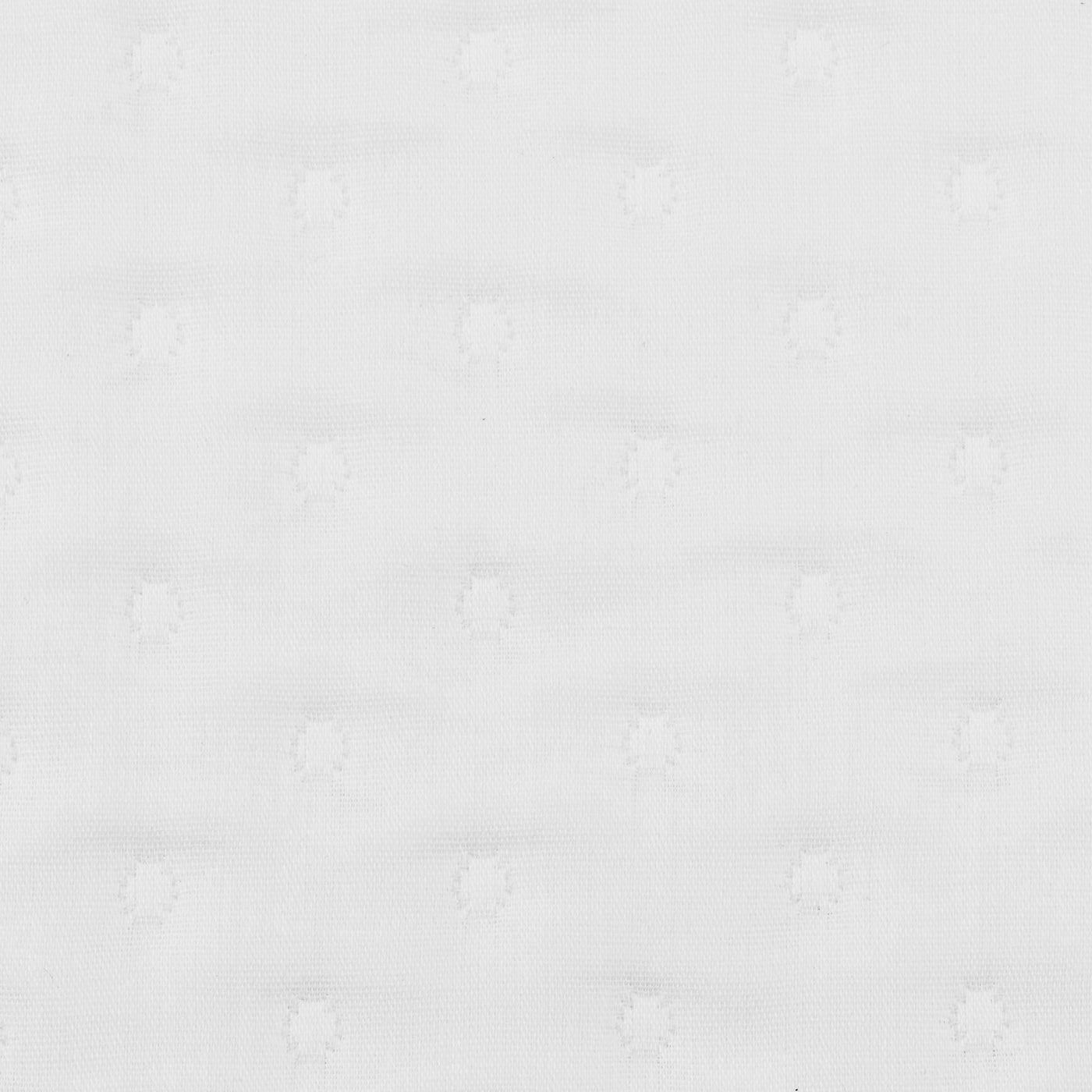 Close-up of Home Treasures Nimbus white woven fabric with tonal dot pattern.