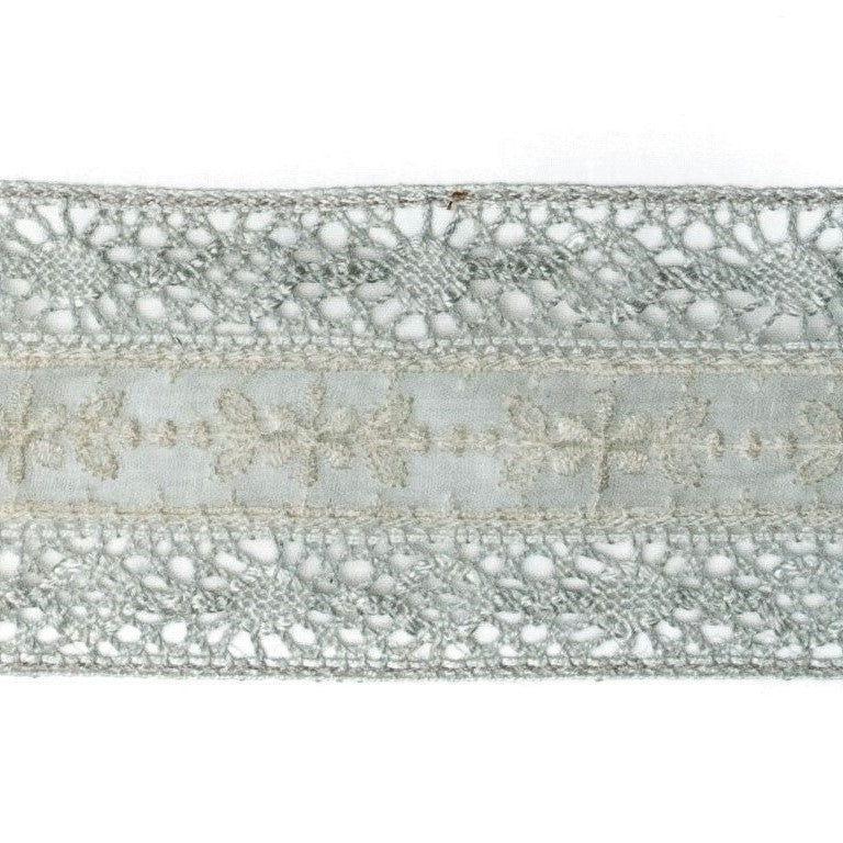 Close-up of Home Treasures Pamela lace trim with floral embroidery in silver-grey.