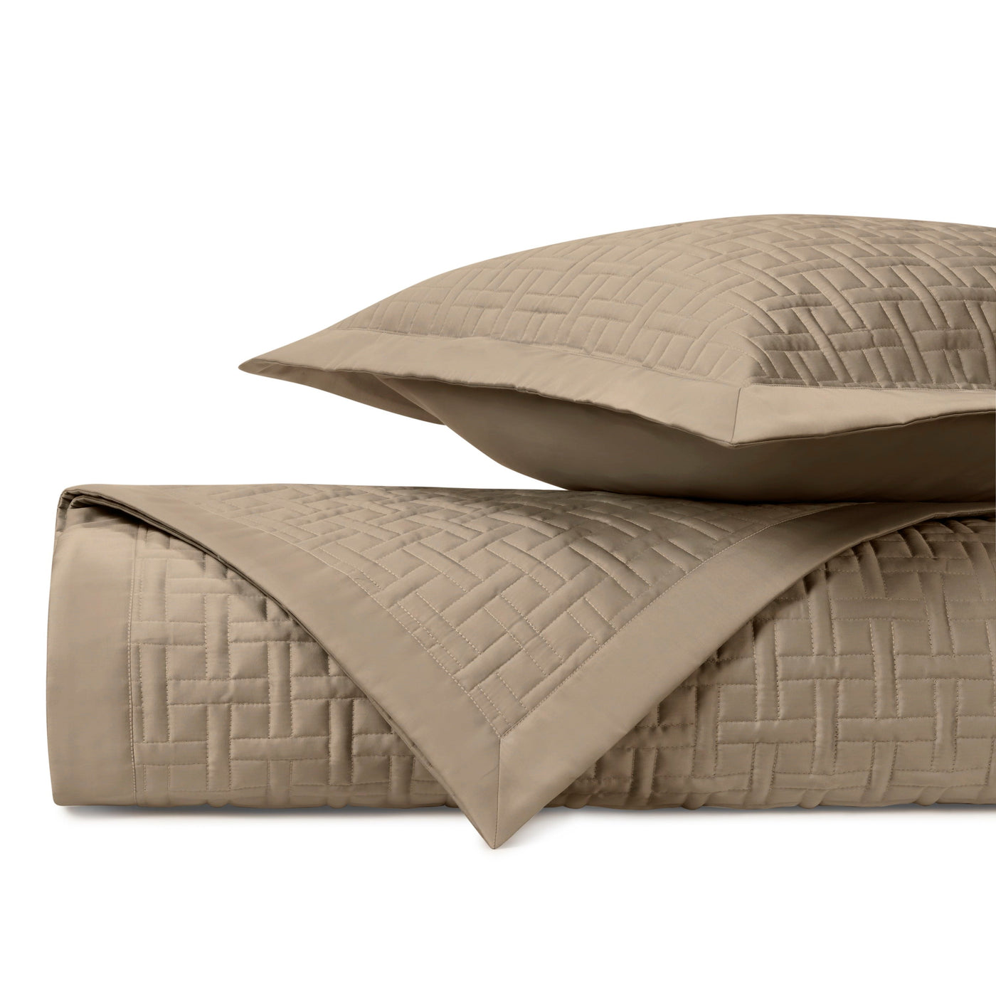 Close-up of Home Treasures Parquet quilted coverlet in taupe with basket-weave stitching.