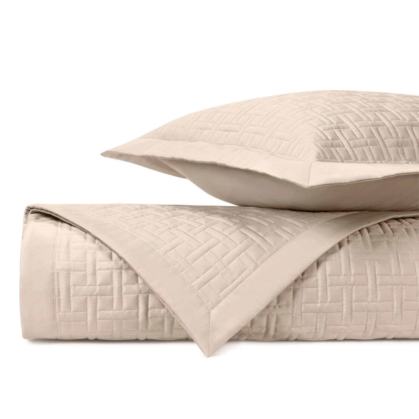 Close-up of Home Treasures Parquet quilted texture in ivory with basket-weave stitching.