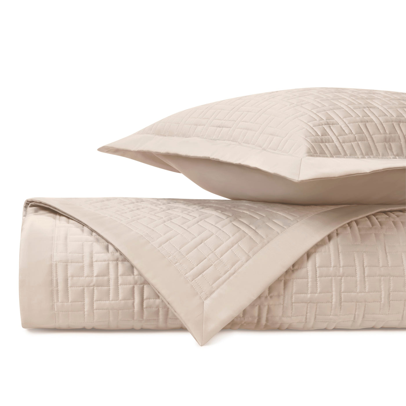 Close-up of Home Treasures Parquet quilted texture in ivory with basket-weave stitching detail.