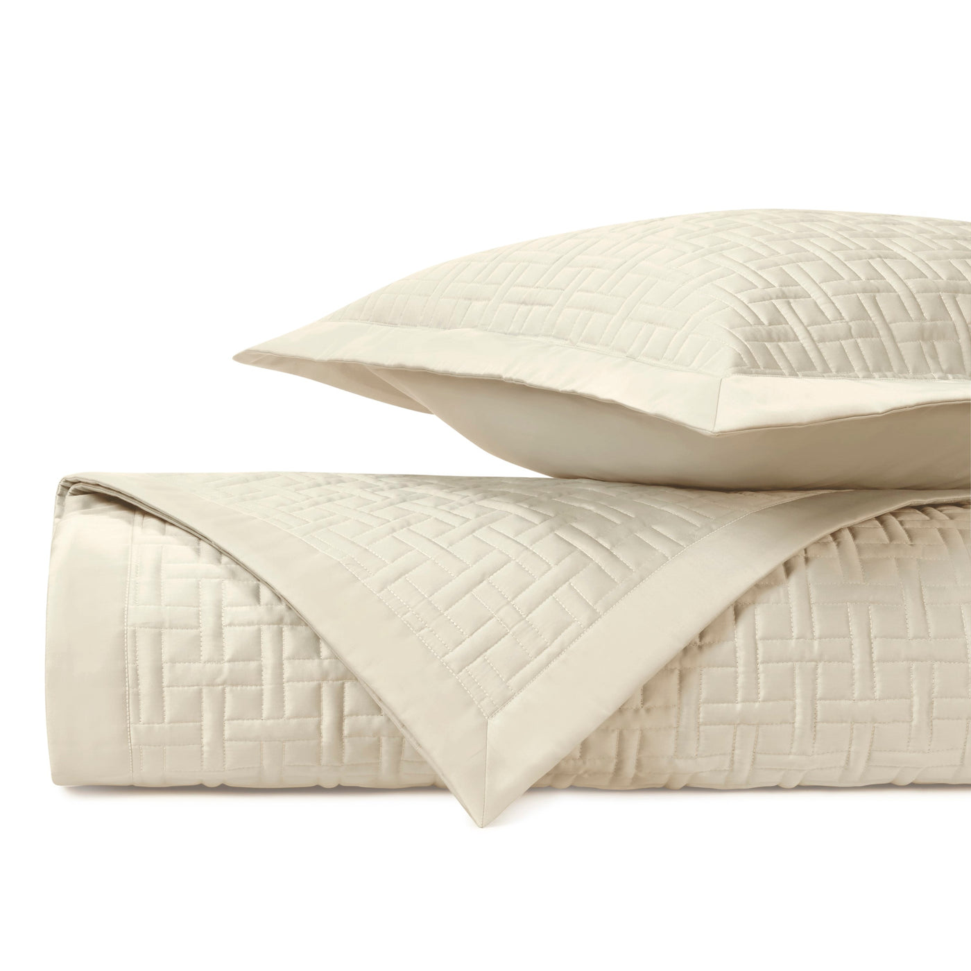 Close-up of Home Treasures Parquet ivory quilted texture with basket-weave stitching detail.