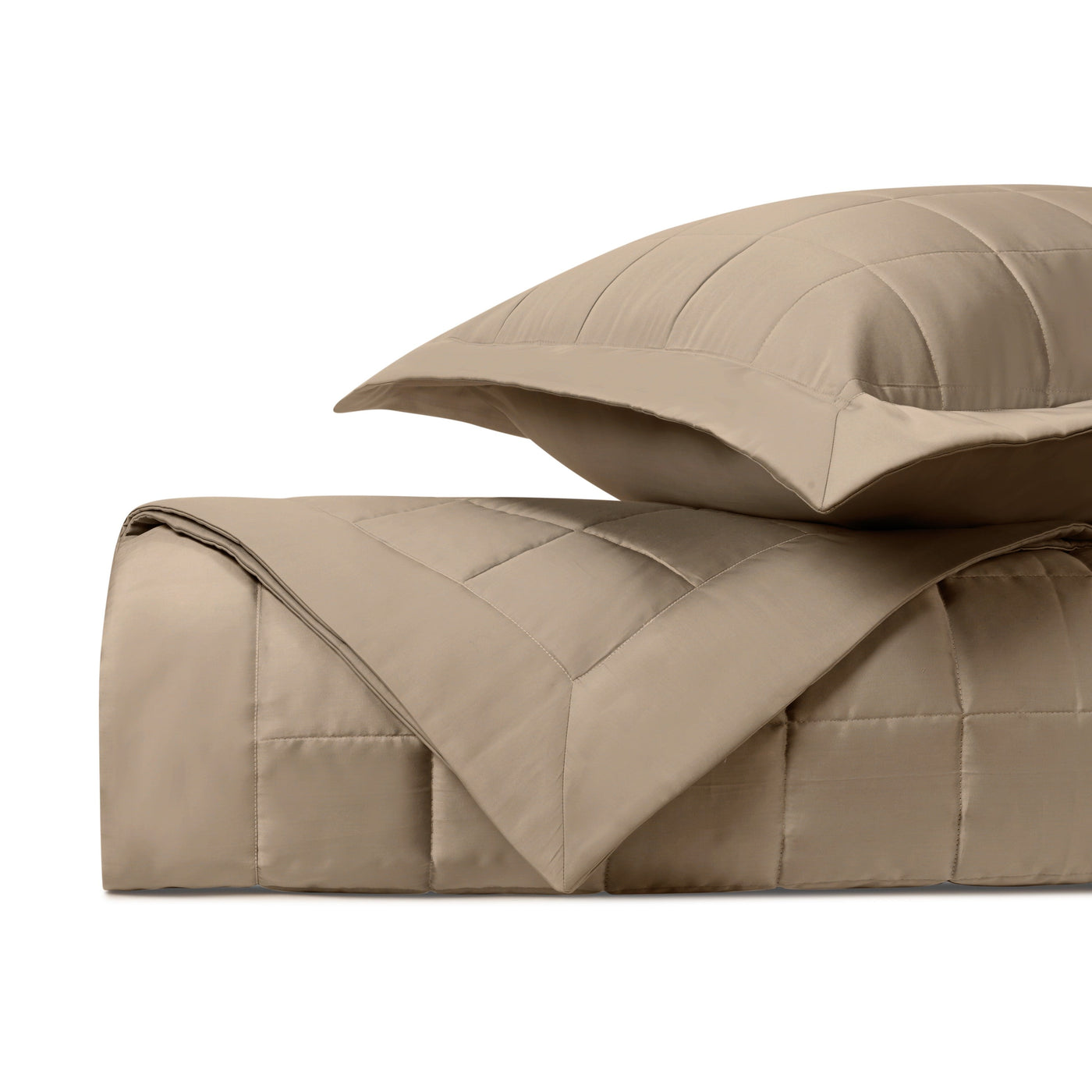 Plateau quilted comforter and sham in khaki, showing grid-stitched texture detail.