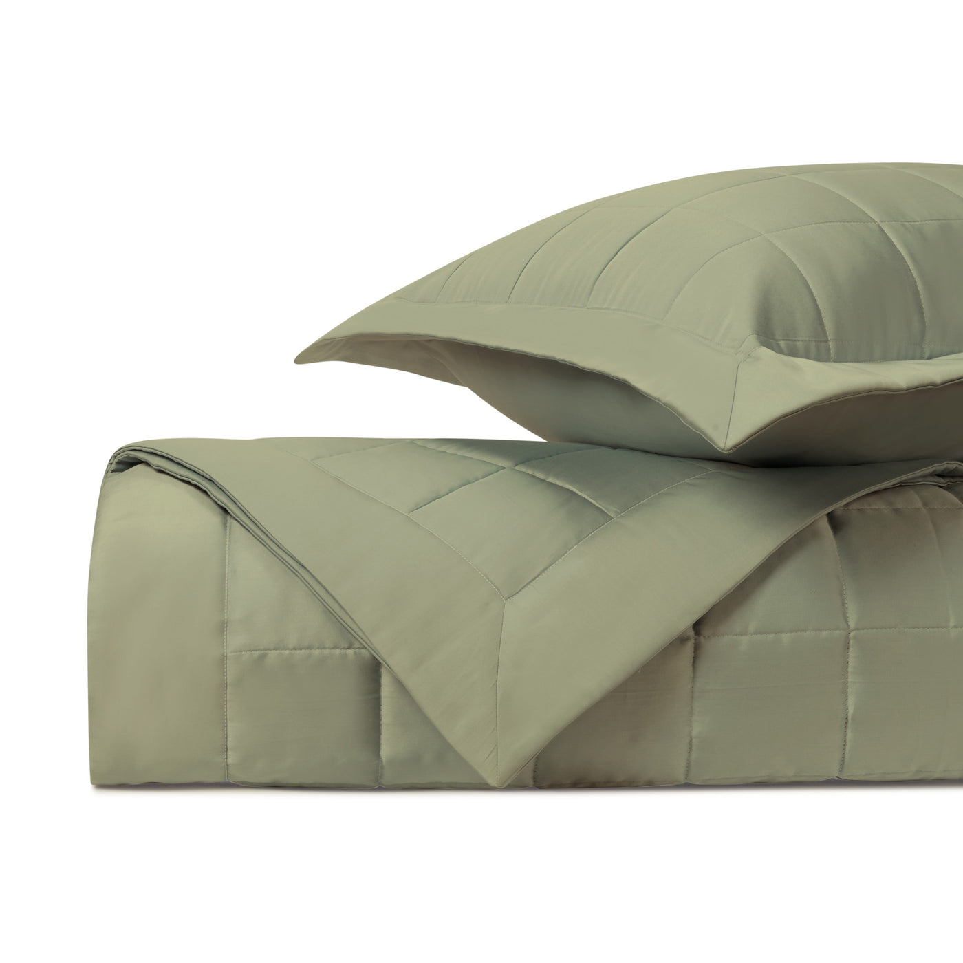 Close-up of Home Treasures Plateau quilted texture in sage green with grid stitching.