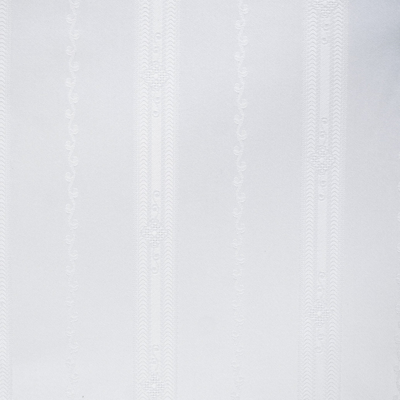 Close-up of white woven stripe texture on Home Treasures Plush 1000 fitted sheet.
