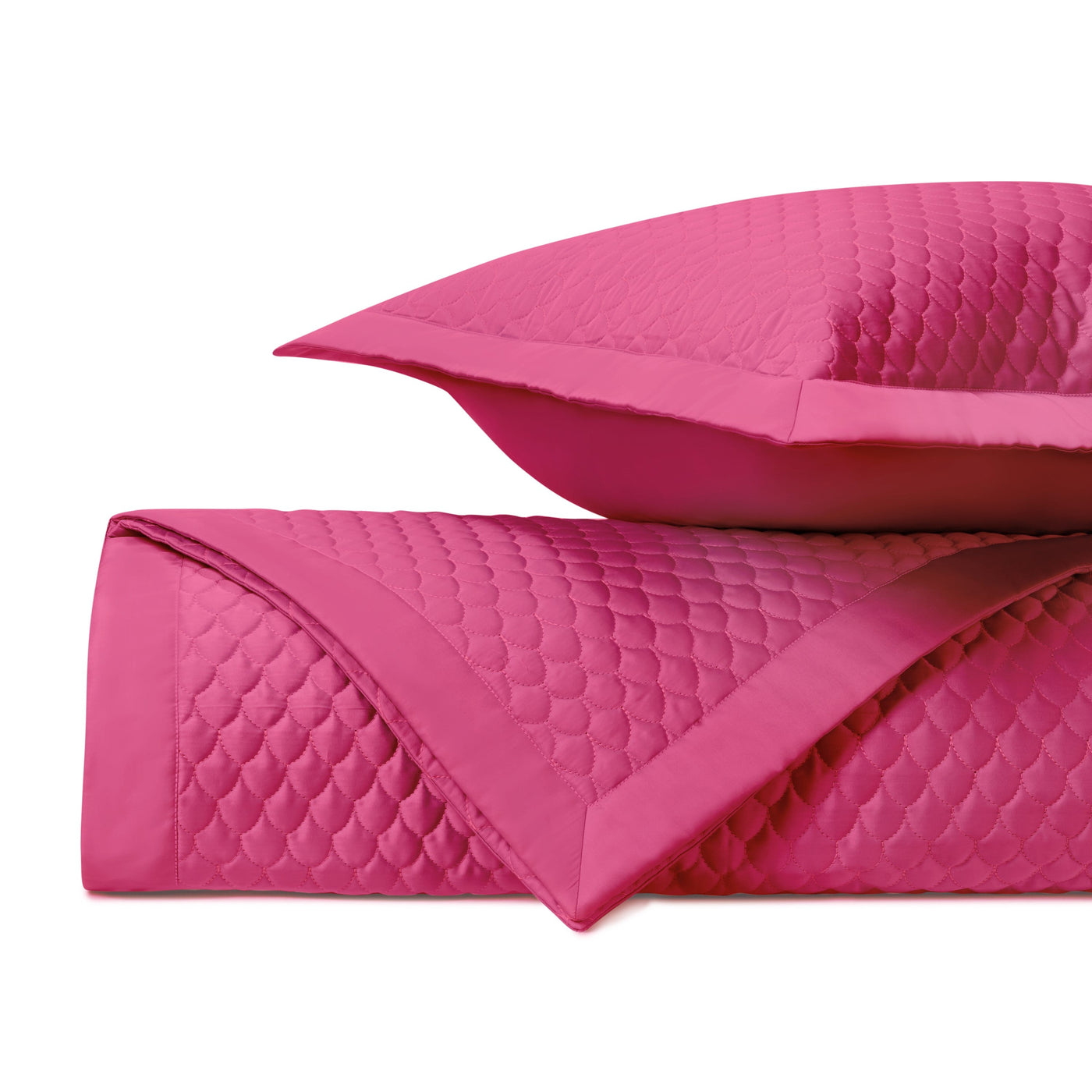 Close-up of Home Treasures Raindrop quilted texture in vivid rose pink.