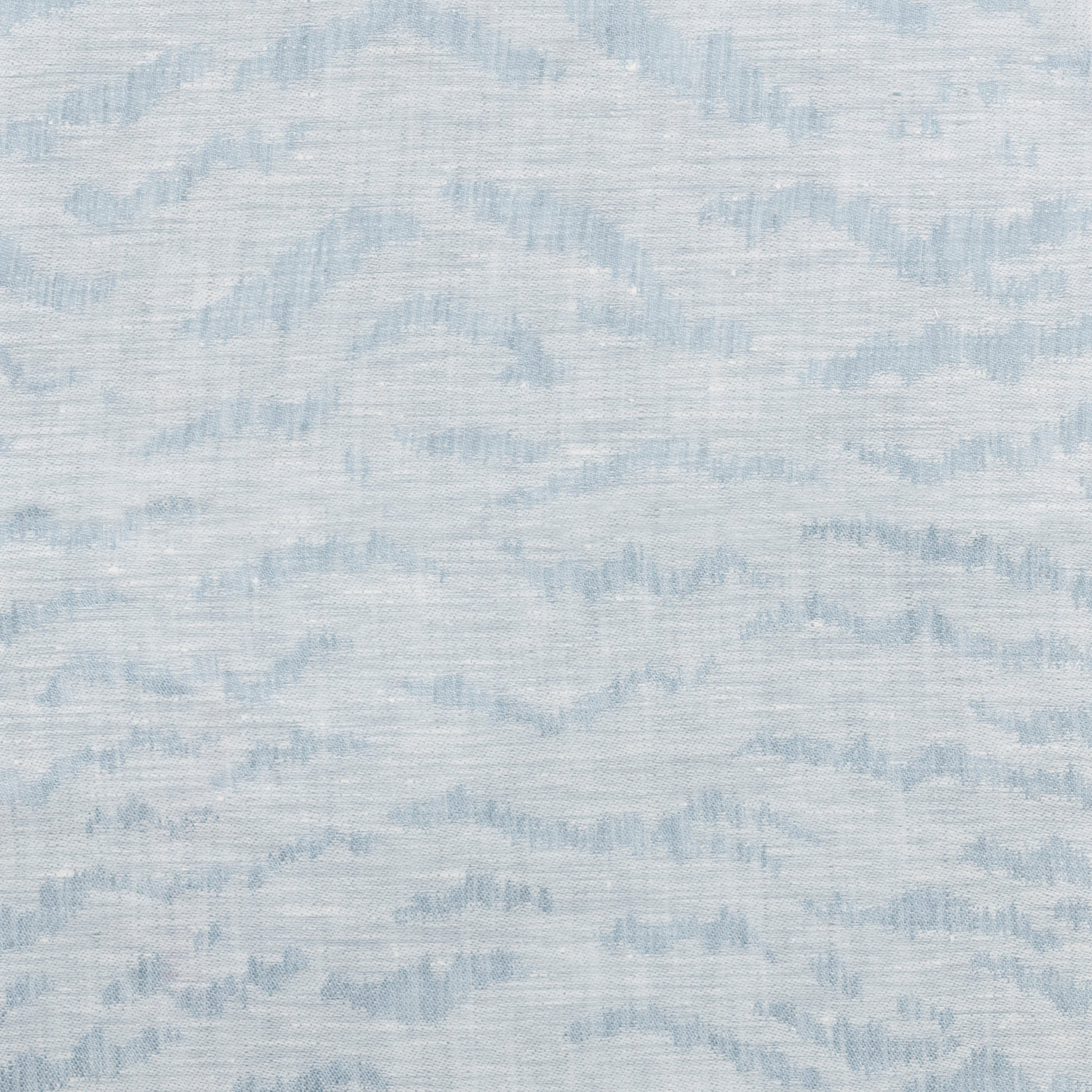 Close-up of Raja linen fabric in powder blue with tonal wave-pattern texture.
