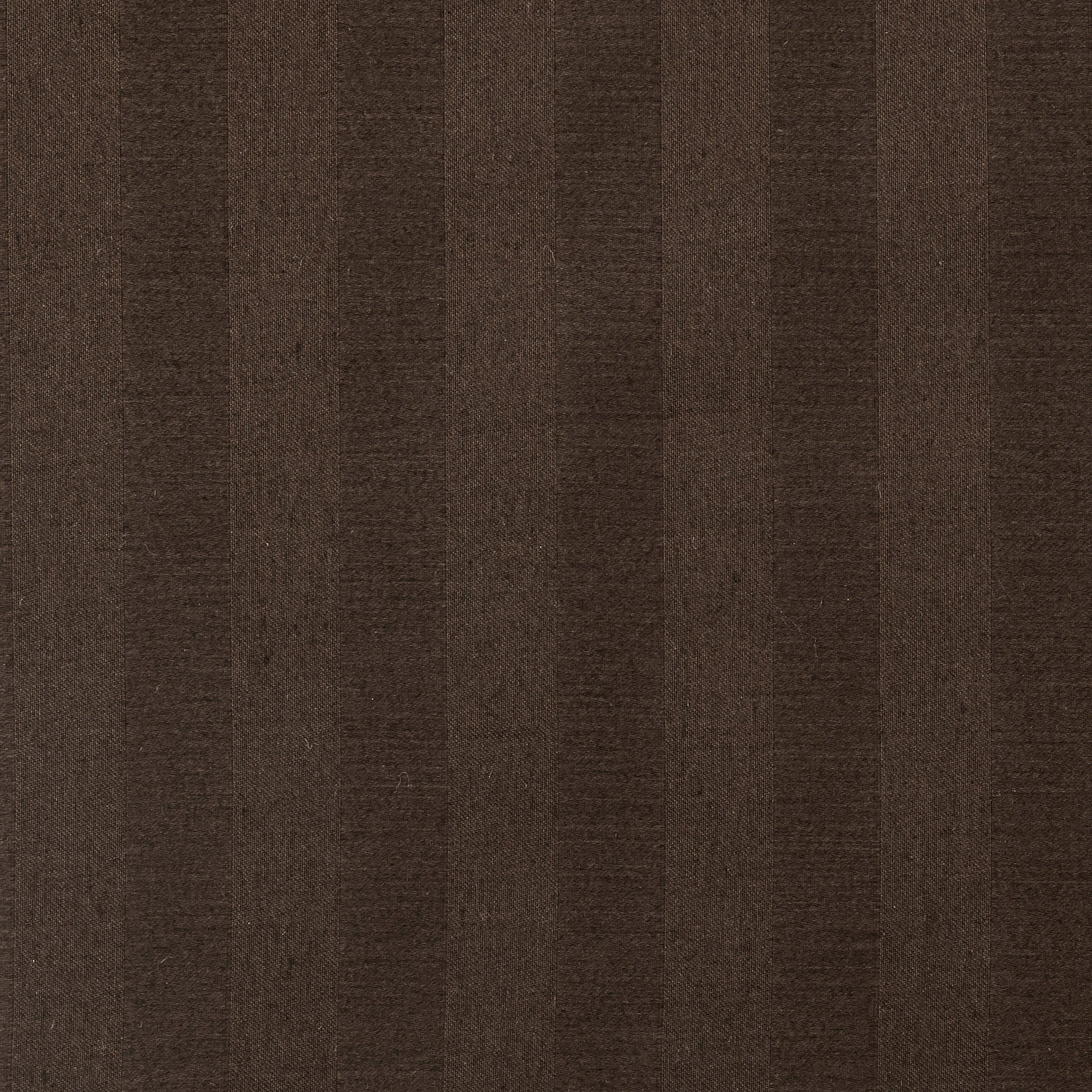 Close-up of tonal satin stripe weave in rich espresso cotton fabric.