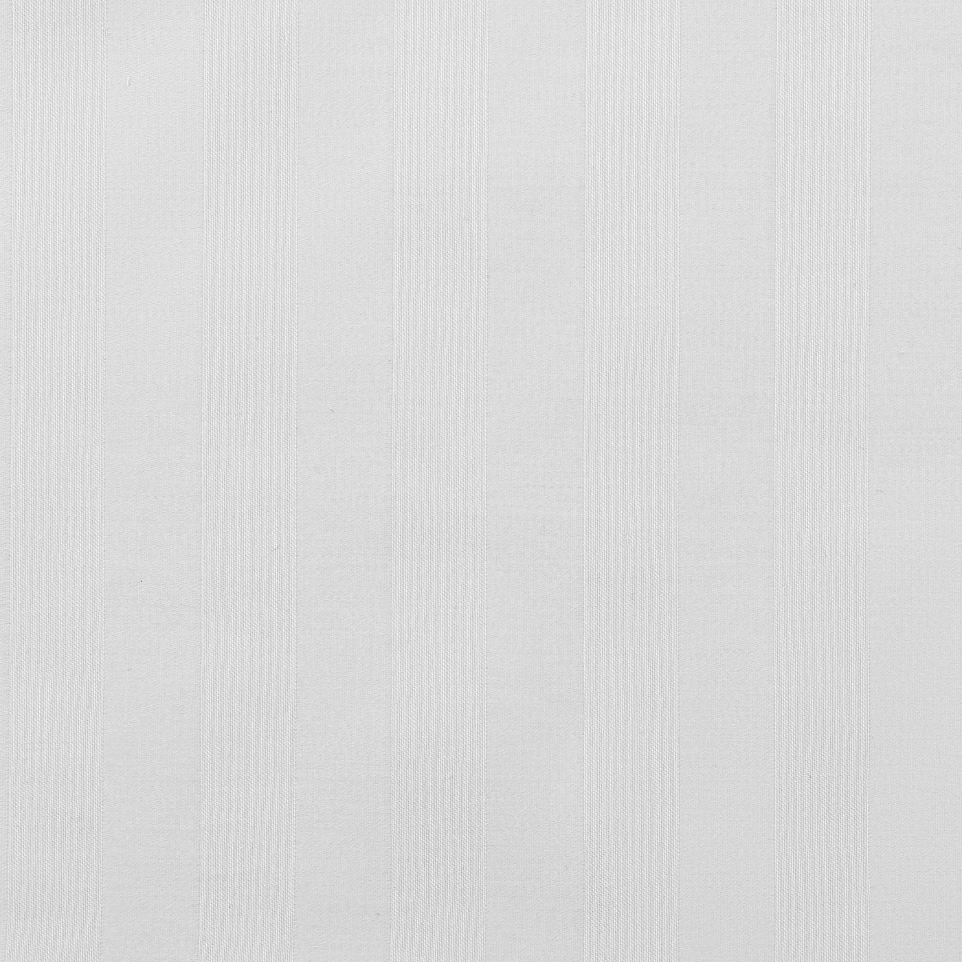 Close-up of white woven cotton fabric with subtle vertical texture detail.