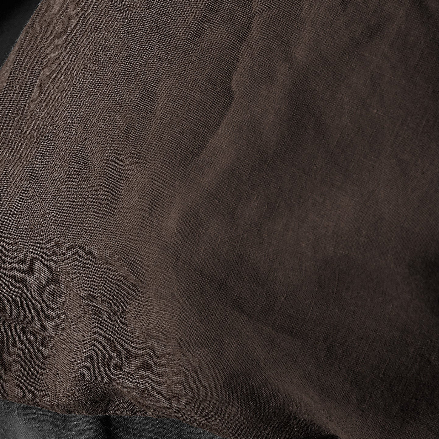 Close-up of Society Limonta Rem duvet cover in espresso linen, showing natural texture.
