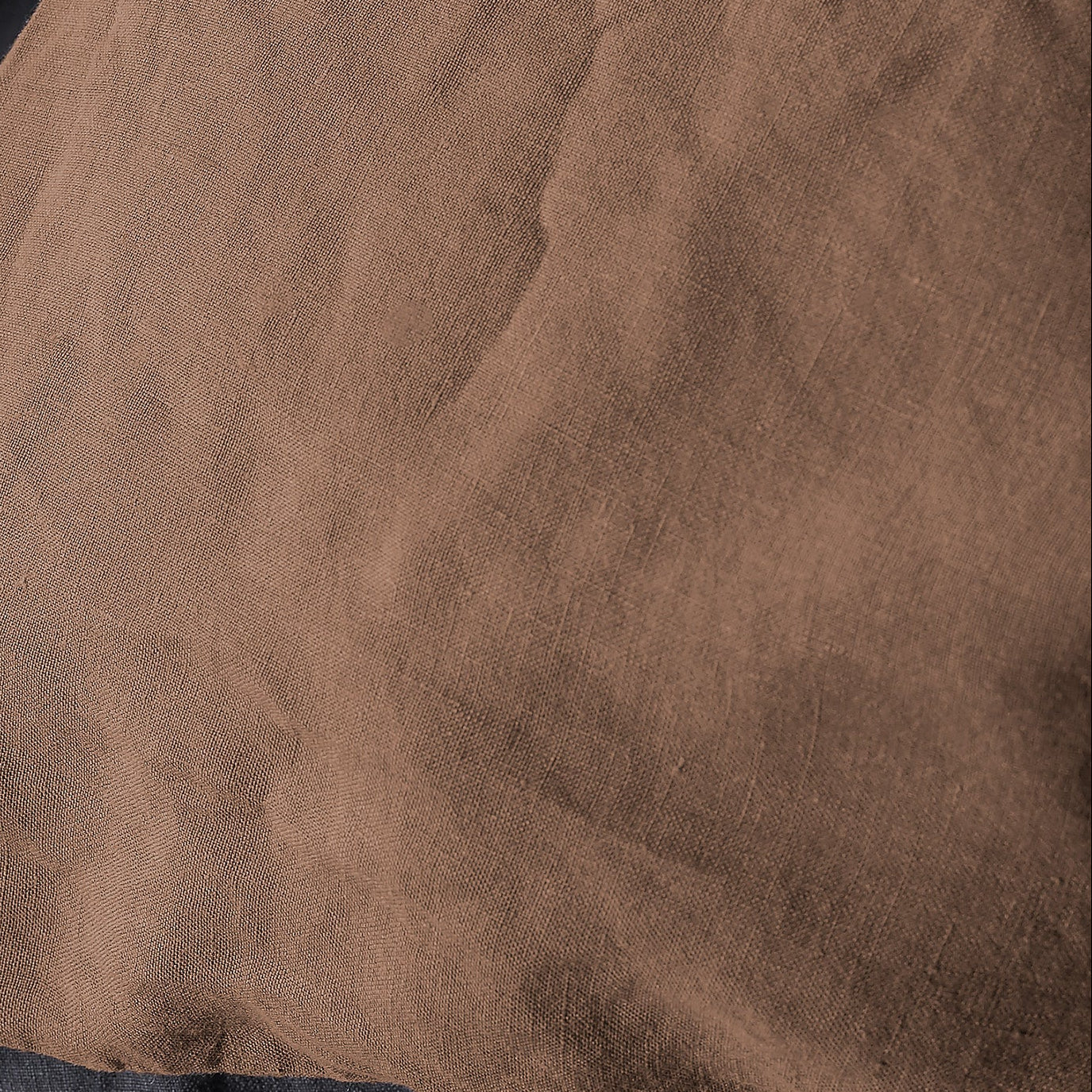 Close-up of Society Limonta Rem duvet cover in warm mocha linen weave texture.