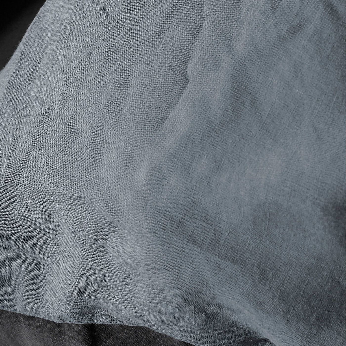 Close-up of Society Limonta Rem duvet cover in slate linen, showing relaxed texture.