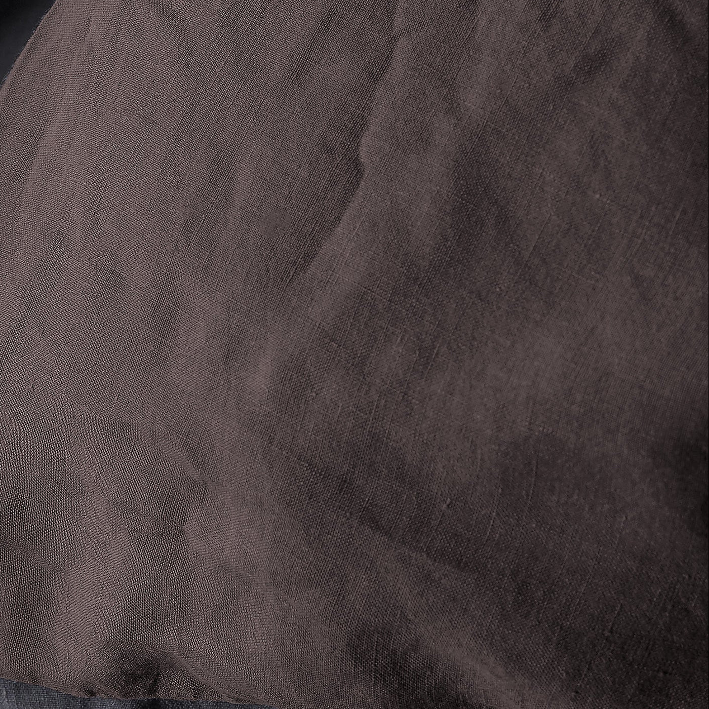 Close-up of Society Limonta Rem duvet cover in deep espresso linen weave texture.