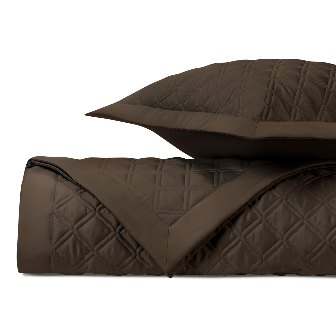 Close-up of Home Treasures Renaissance quilted coverlet in chocolate with diamond stitching.