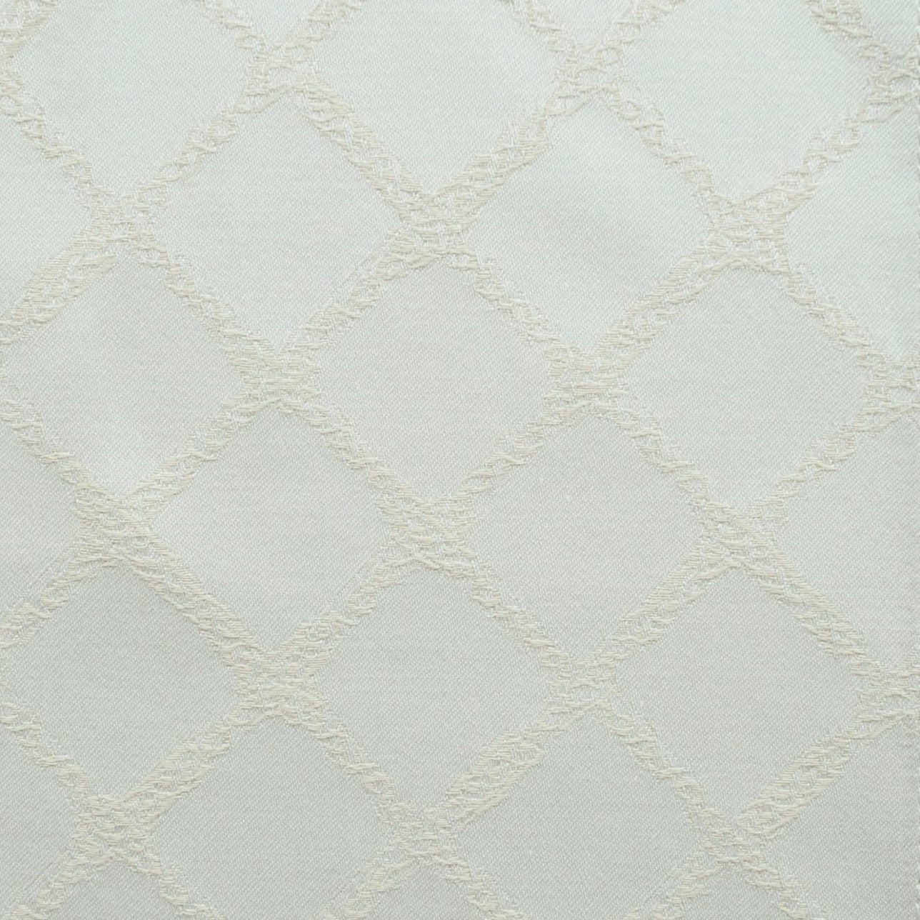 Close-up of ivory trellis jacquard weave texture on pearl linen flat sheet.