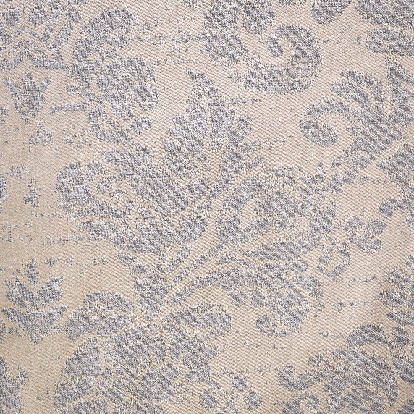 Close-up of Renaissance duvet cover's faded damask weave in silver and ivory linen.