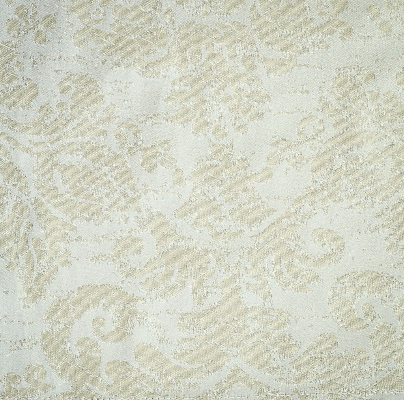 Close-up of ivory damask jacquard weave on Home Treasures Renaissance duvet cover.