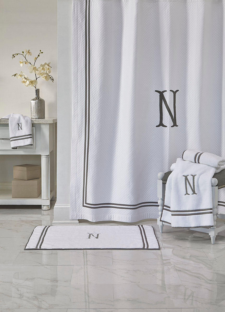 Close-up of Home Treasures Ribbons white cotton with charcoal double-border stripe detail.