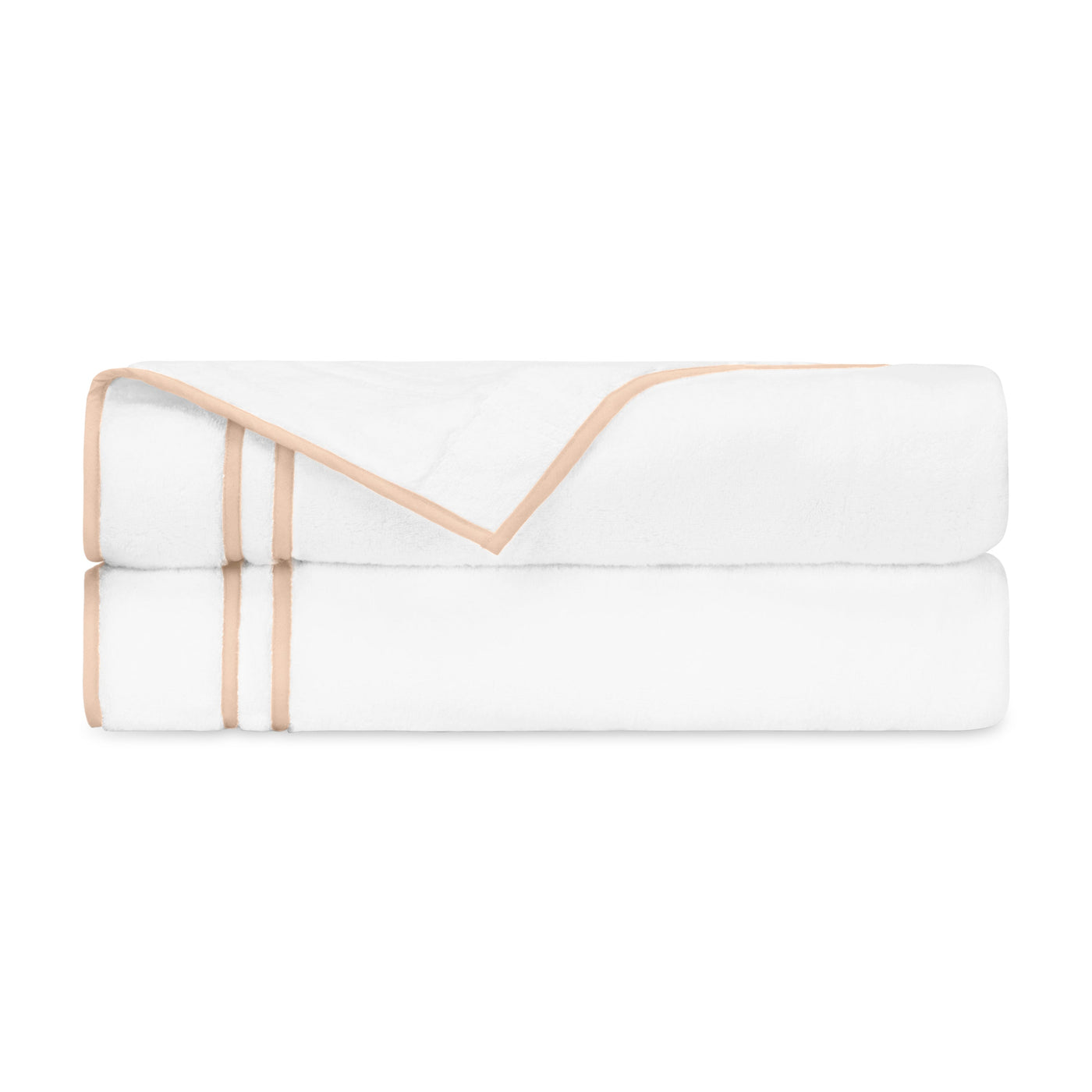 Two folded white bath towels with champagne ribbon trim detail.
