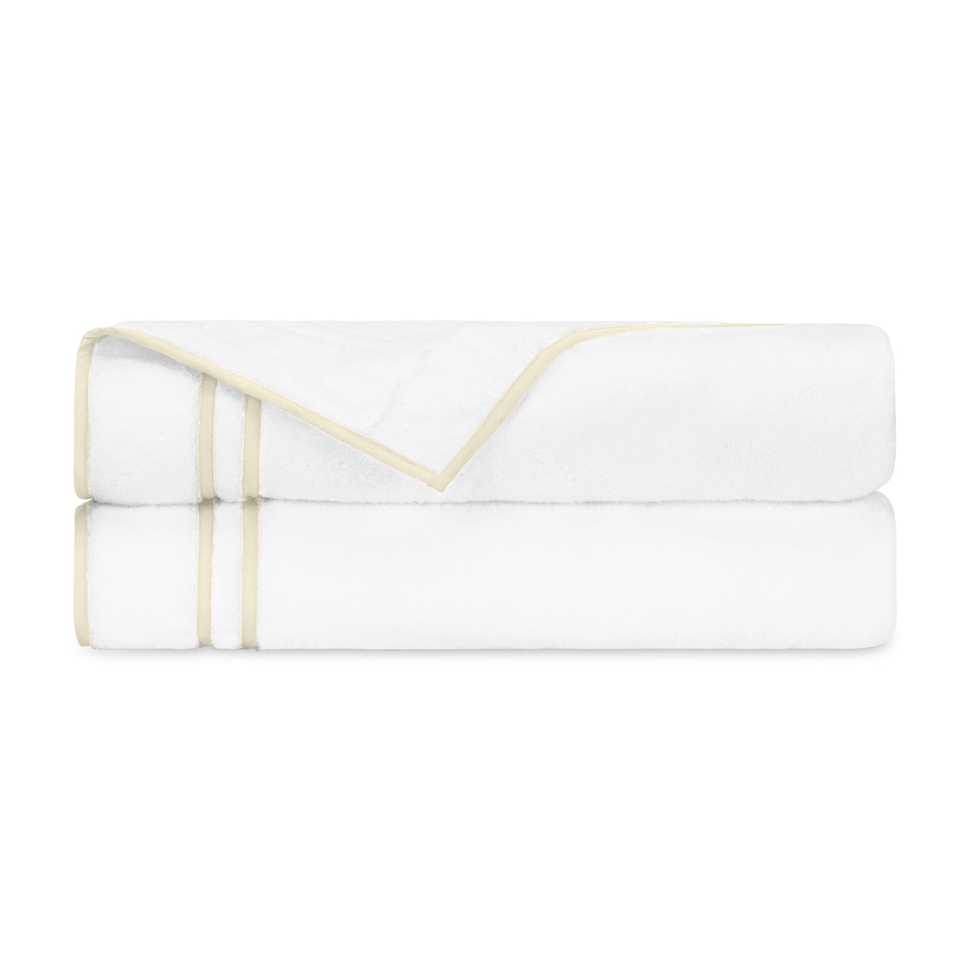 Two folded white bath towels with champagne double-stripe border trim.
