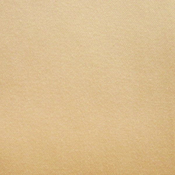 Close-up of champagne sateen fabric showing smooth, lustrous weave texture.
