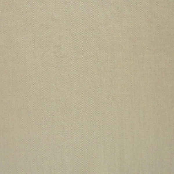 Close-up of champagne linen-cotton fabric texture showing fine woven detail.