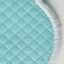 Close-up of Savannah Gardens | Tablecloth by Matouk in light blue diamond pique with diamond stitching and a white embroidered edge—ideal for easy care, elegant table linens.