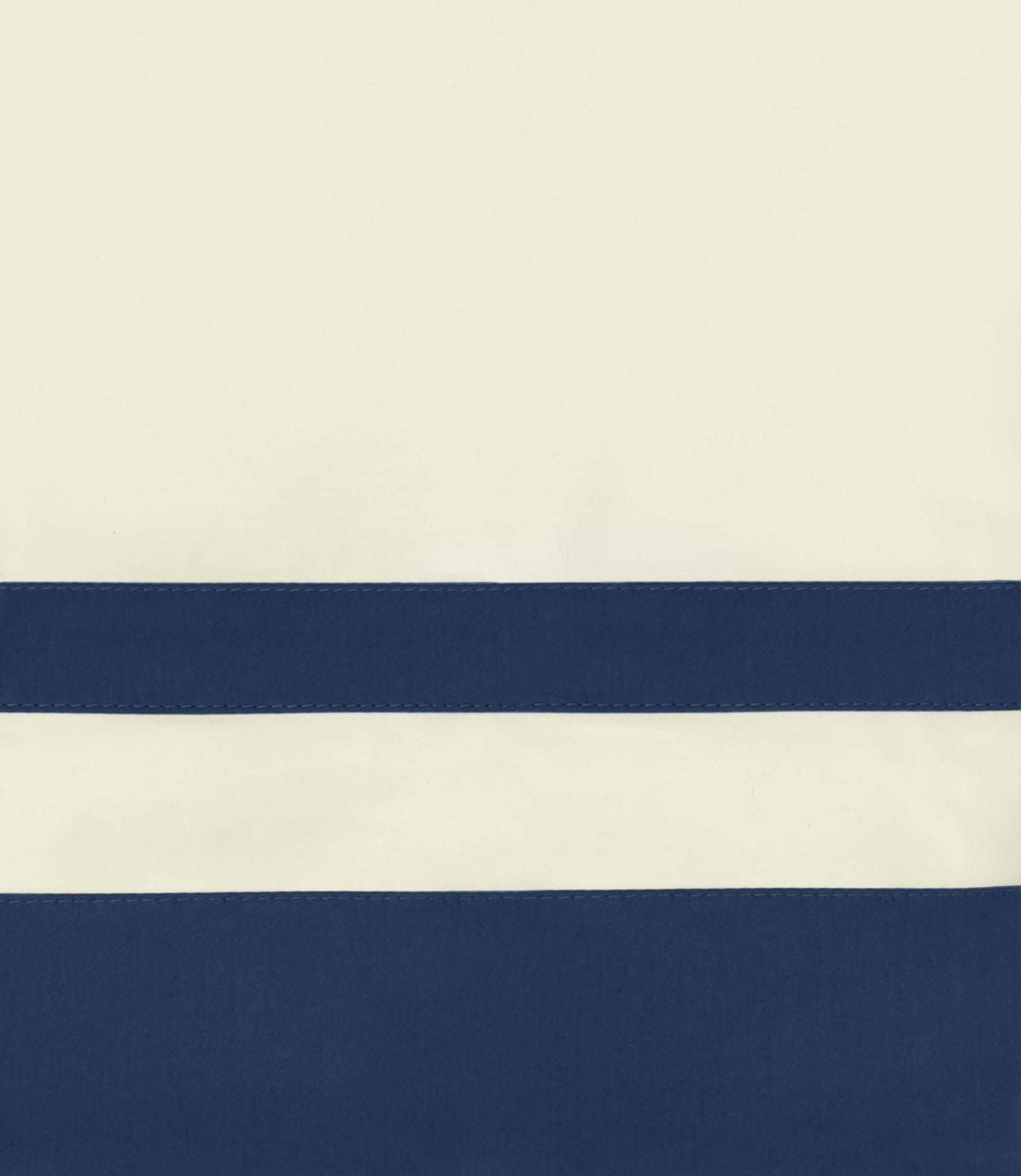 Close-up of ivory and navy stripe border with topstitched hem detail.