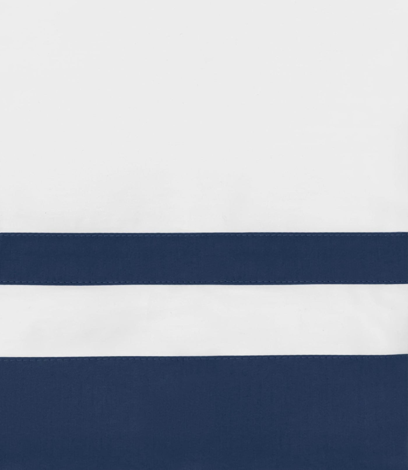 Close-up of navy border stripe detail on white cotton Savoy duvet cover.