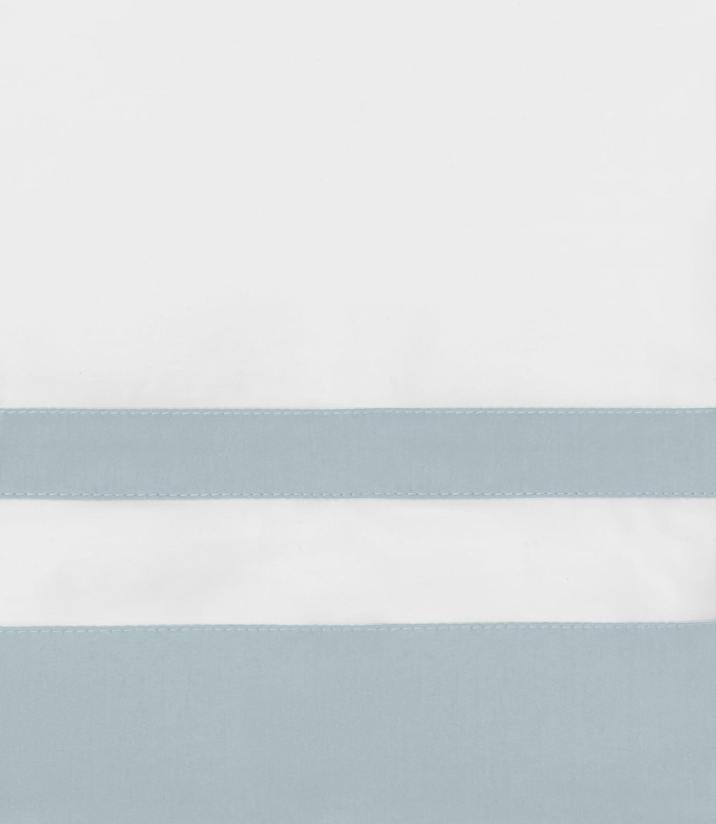 Close-up of white cotton sham with a horizontal mist blue border stripe and topstitching detail.