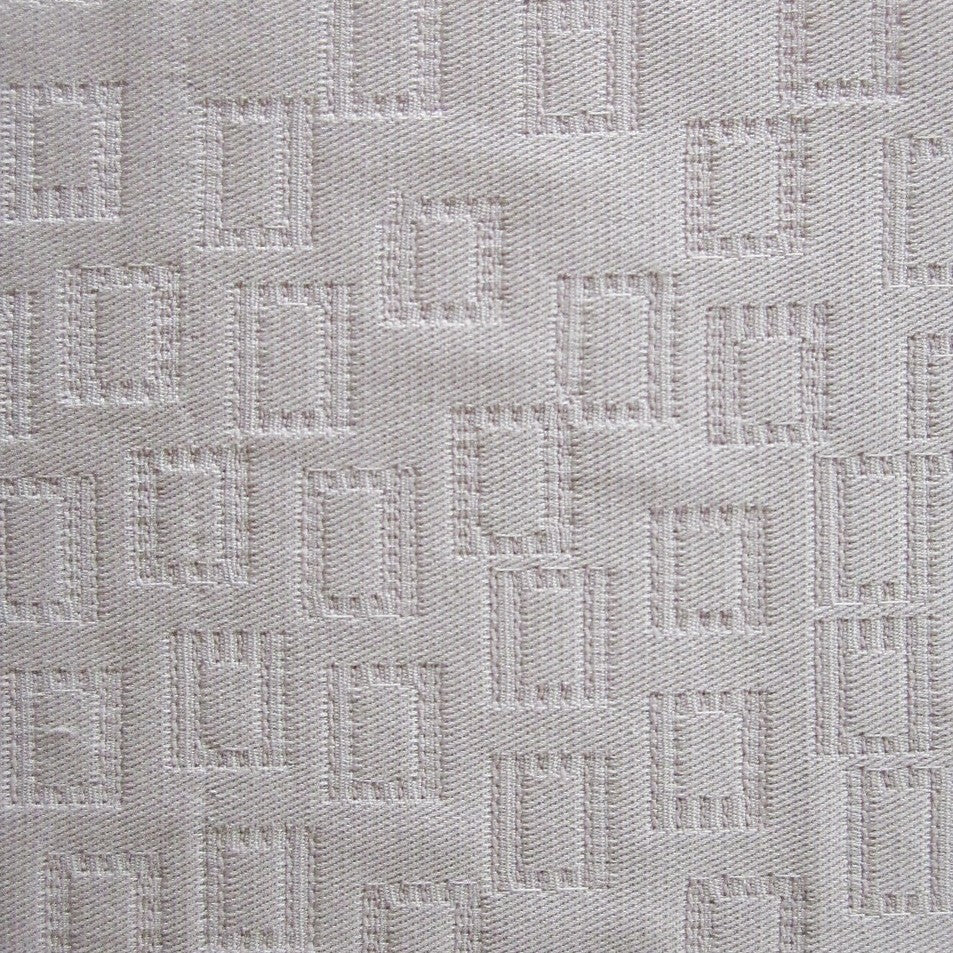 Close-up of Scotland fabric weave in silver, showing geometric square jacquard texture.