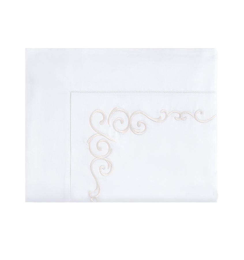 Sferra Giza 45 Severina white flat sheet with champagne scroll embroidery.
