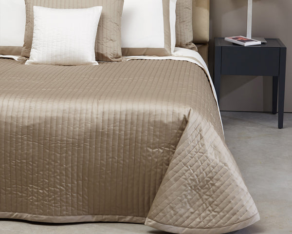 Photo of the Siena Quilted Coverlet ensemble.