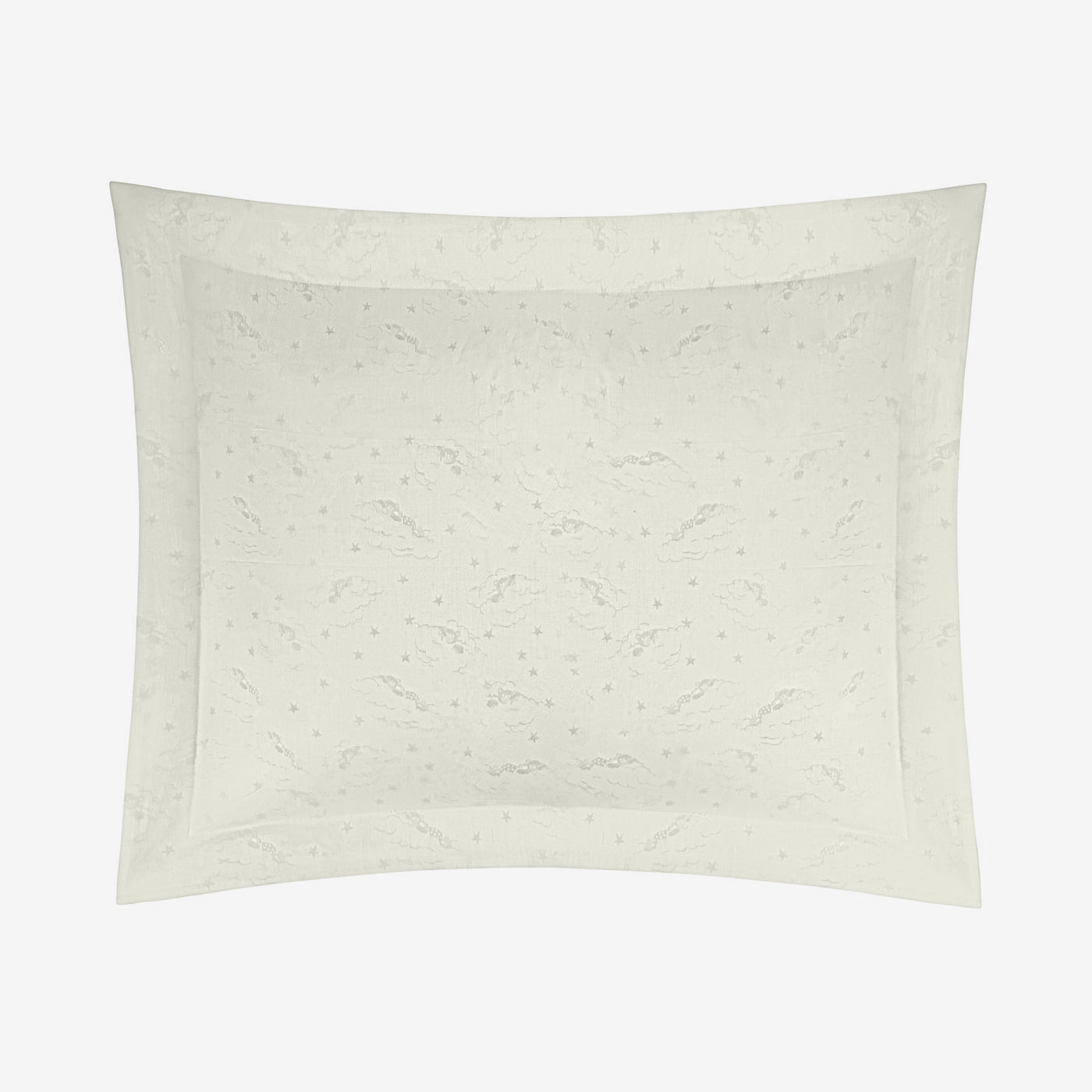 Ivory cotton pillow sham with tonal floral jacquard pattern and contrast flange border.