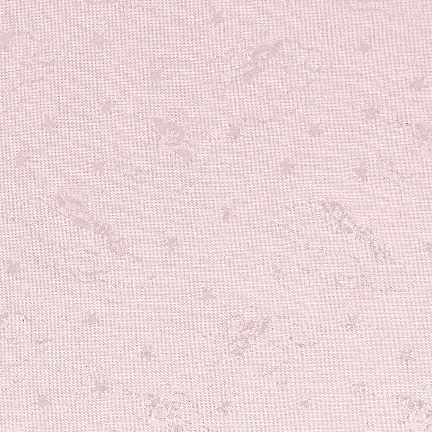 Close-up of blush pink fabric with tonal woven star and cloud pattern.