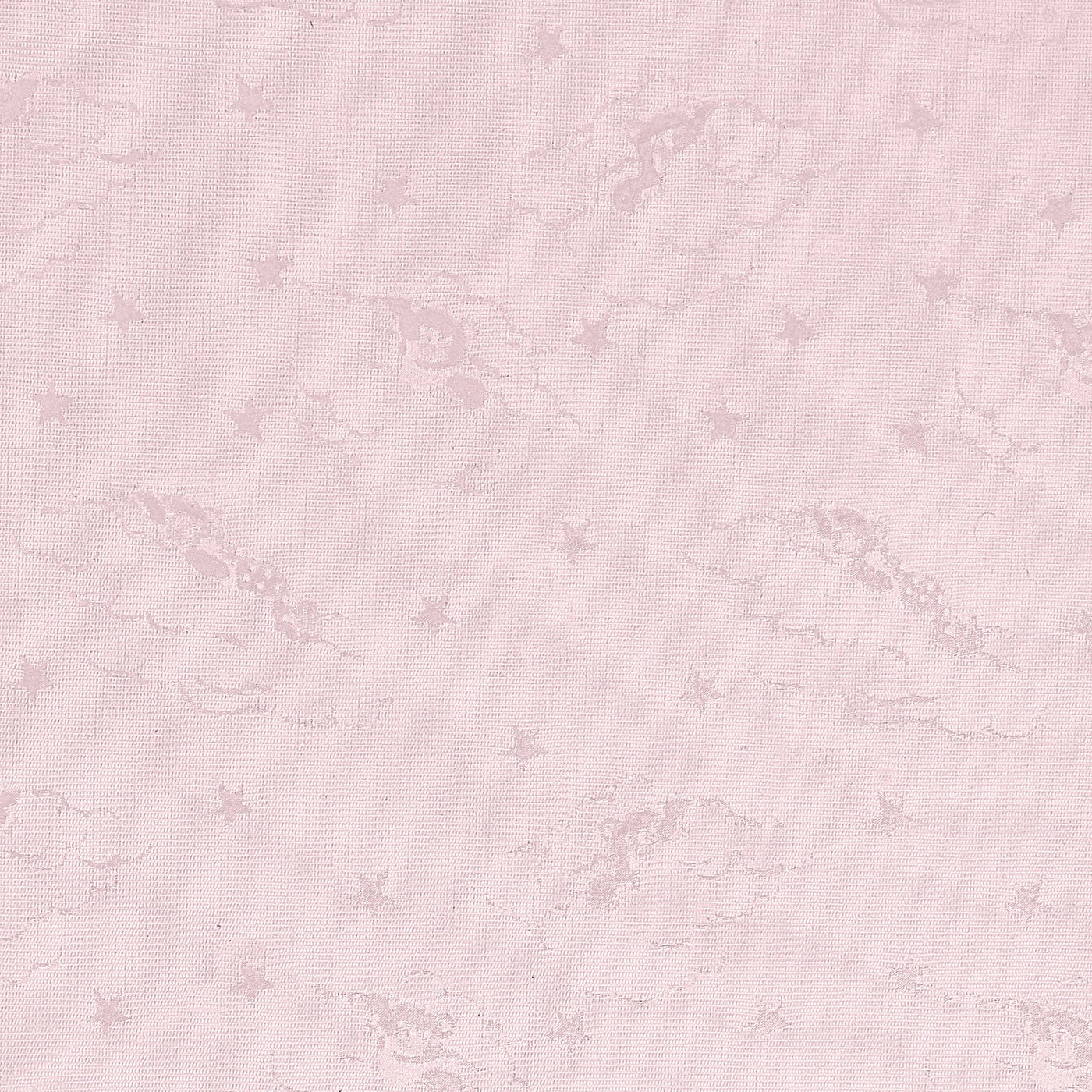 Close-up of blush pink cotton fabric with tonal woven stars and cloud motifs.