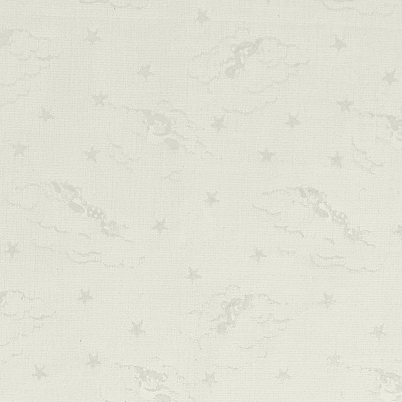 Close-up of ivory jacquard fabric with subtle woven star and cloud pattern.