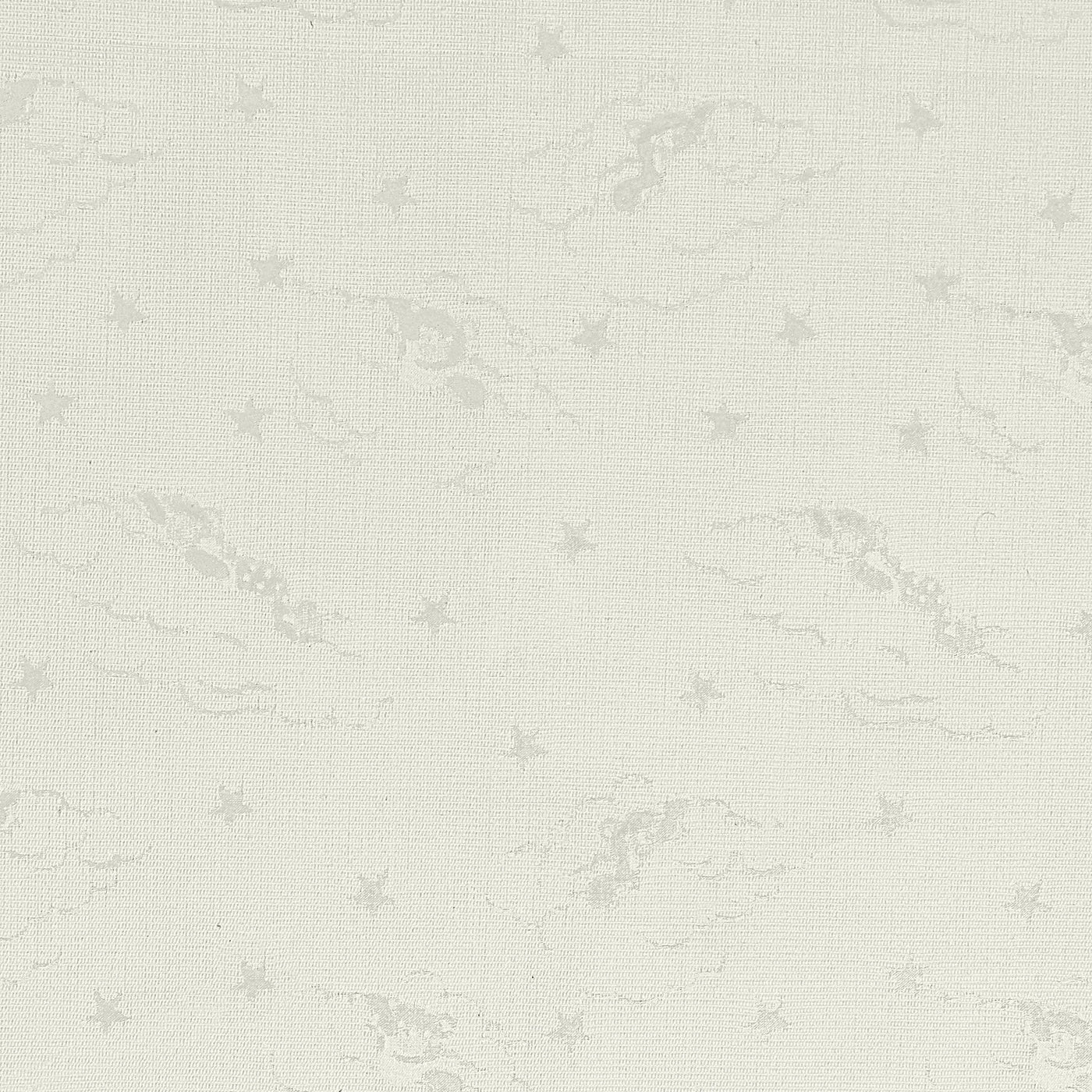 Close-up of ivory jacquard weave with tonal star and cloud pattern detail.