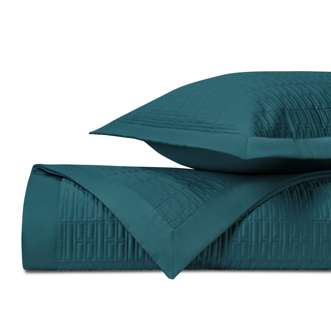 Close-up of Home Treasures Sydney quilted coverlet and sham in deep teal.