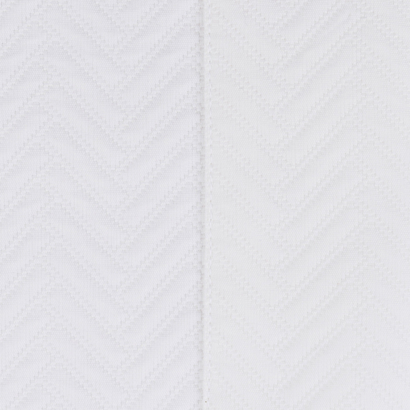 Close-up of white woven chevron texture on Home Treasures Thatcher coverlet.
