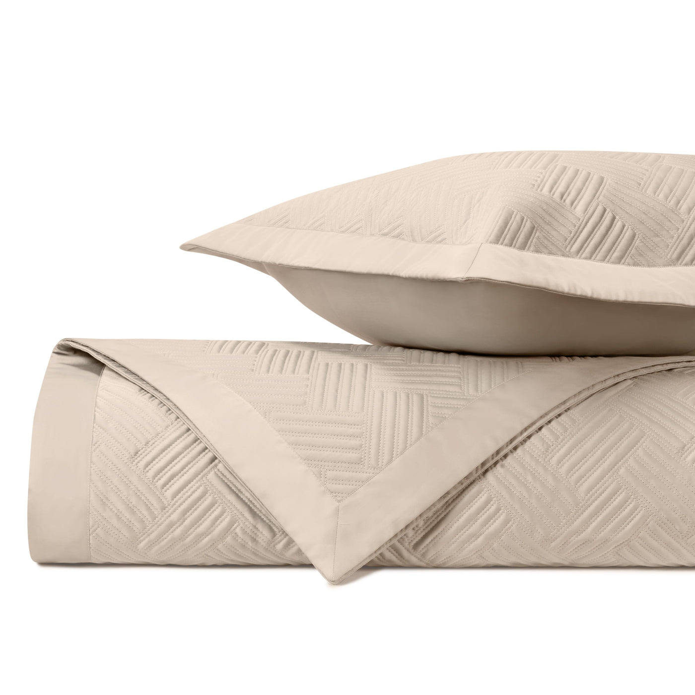 Close-up of Home Treasures Twilight quilted texture in ivory with geometric basket-weave pattern.