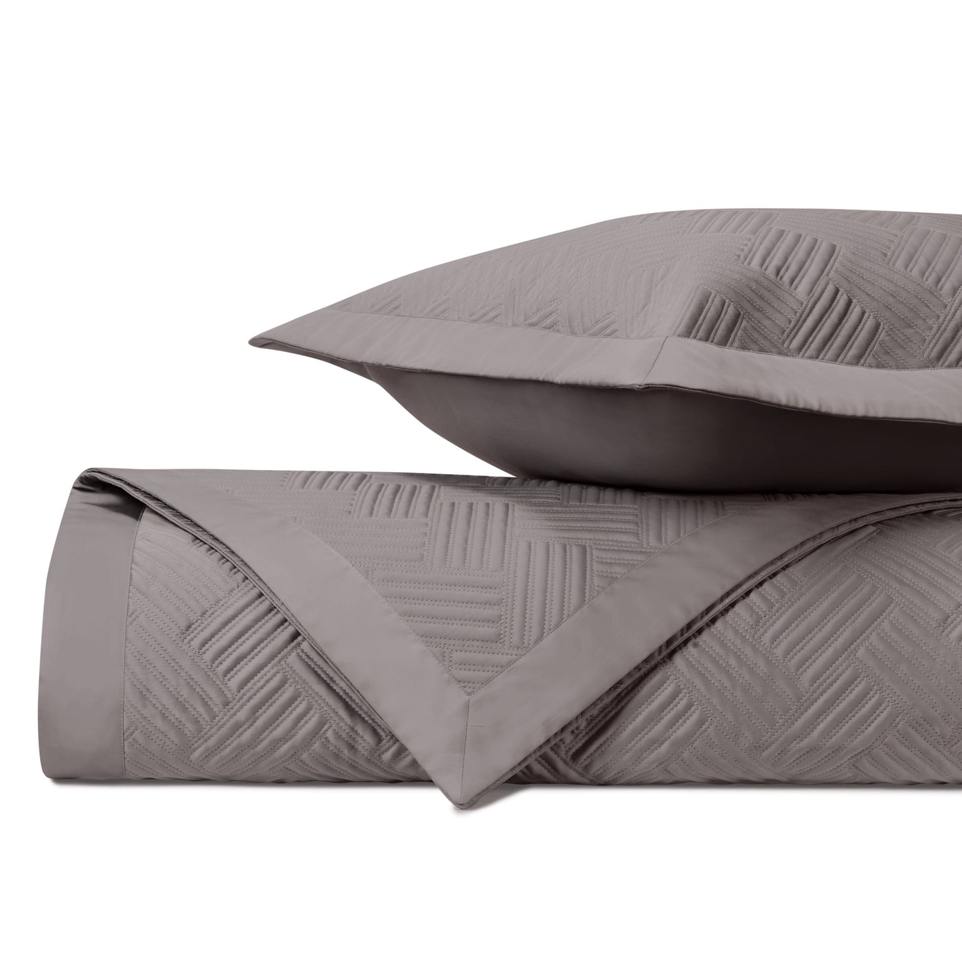 Close-up of Home Treasures Twilight quilted texture in taupe, showing geometric basket-weave pattern.