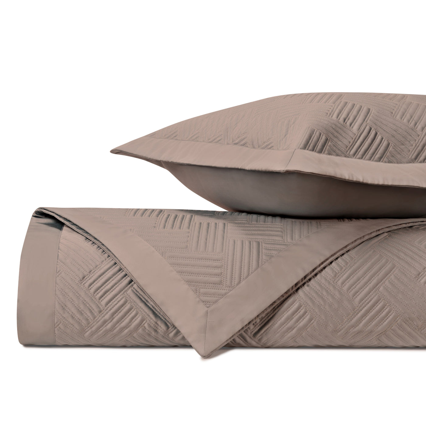 Close-up of Home Treasures Twilight quilted texture in taupe with geometric channel stitching.