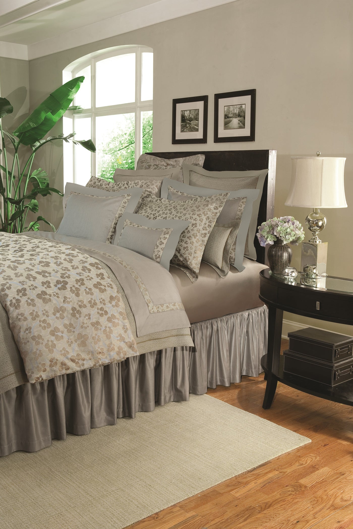 Close-up of Valentene bedding in taupe and silver with floral jacquard pattern.