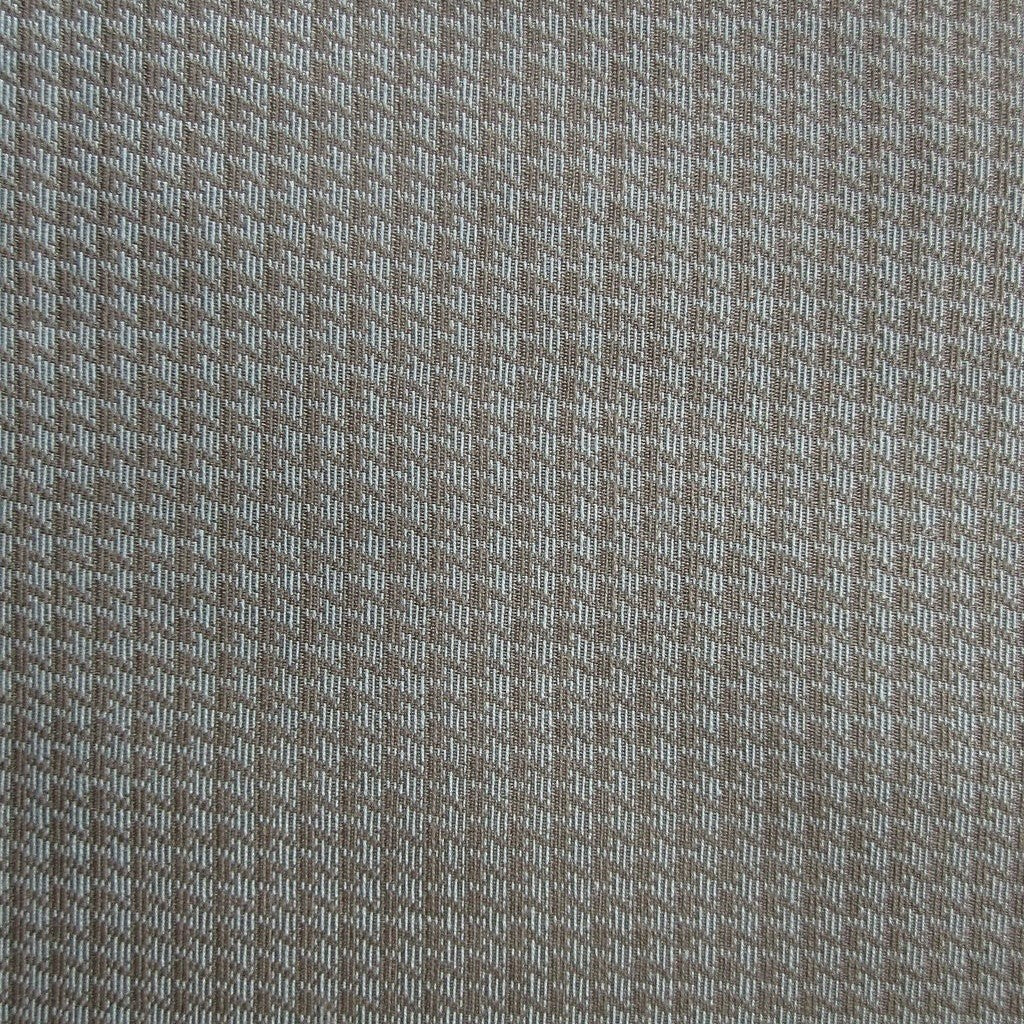 Close-up of Valentene fitted sheet woven texture in warm taupe and ivory.