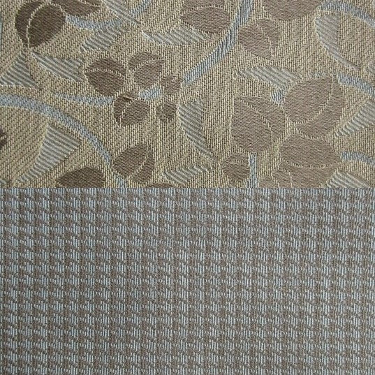 Close-up of taupe floral jacquard weave alongside a fine waffle-texture fabric in silver-grey.