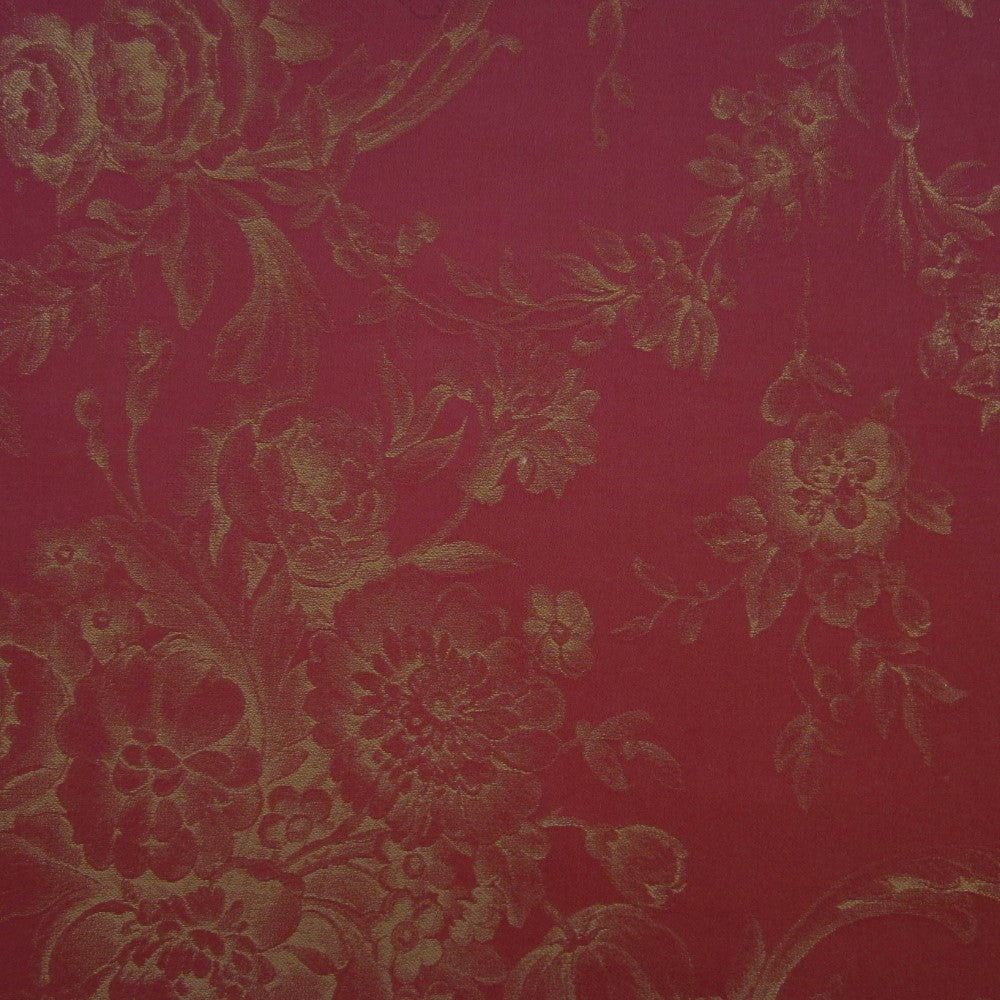 Close-up of Home Treasures Victoria fabric in crimson with tonal gold floral jacquard weave.