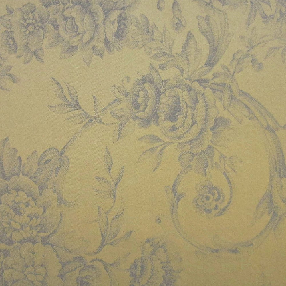 Close-up of Victoria duvet cover fabric in gold with grey toile floral print.