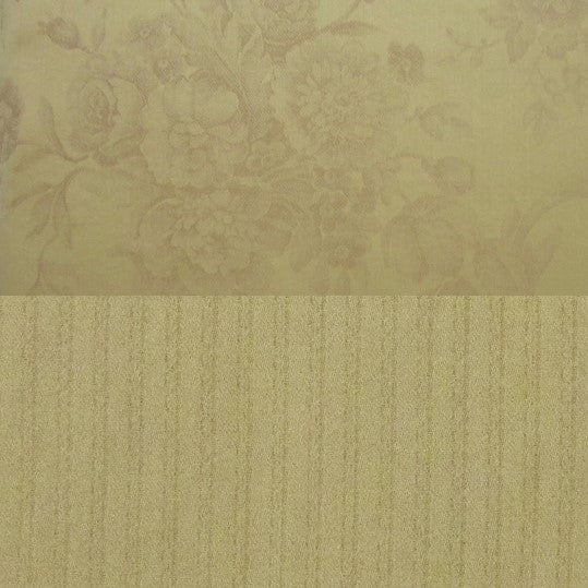 Close-up of champagne floral jacquard and textured stripe weave on Victoria duvet cover.